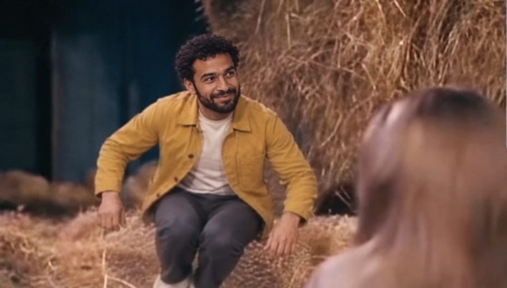 Illustrative replacement of the dancer with the mustard-jacket character in the source barn frame